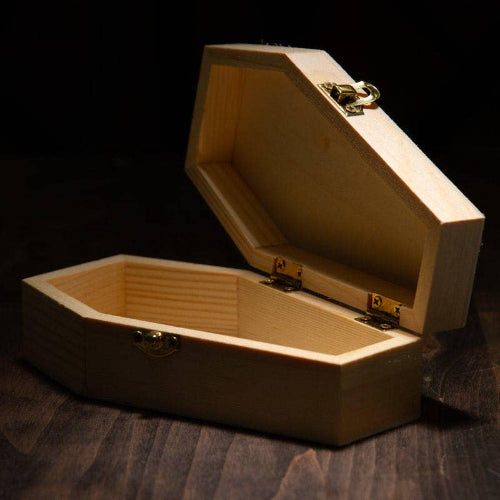 Wooden jewelry box with a dark background